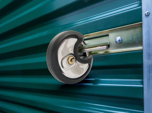 Brinks discus lock on a storage unit roll-up door